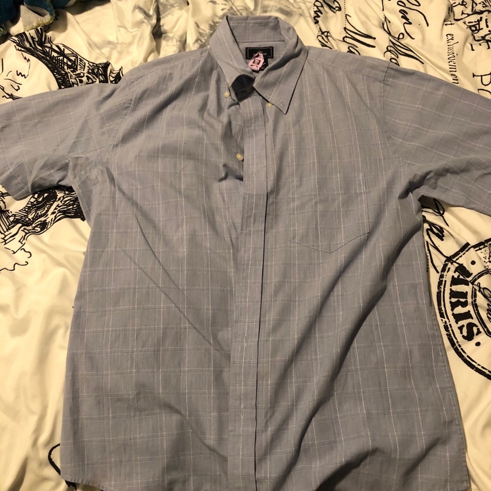 Blue Dockers button on shirt